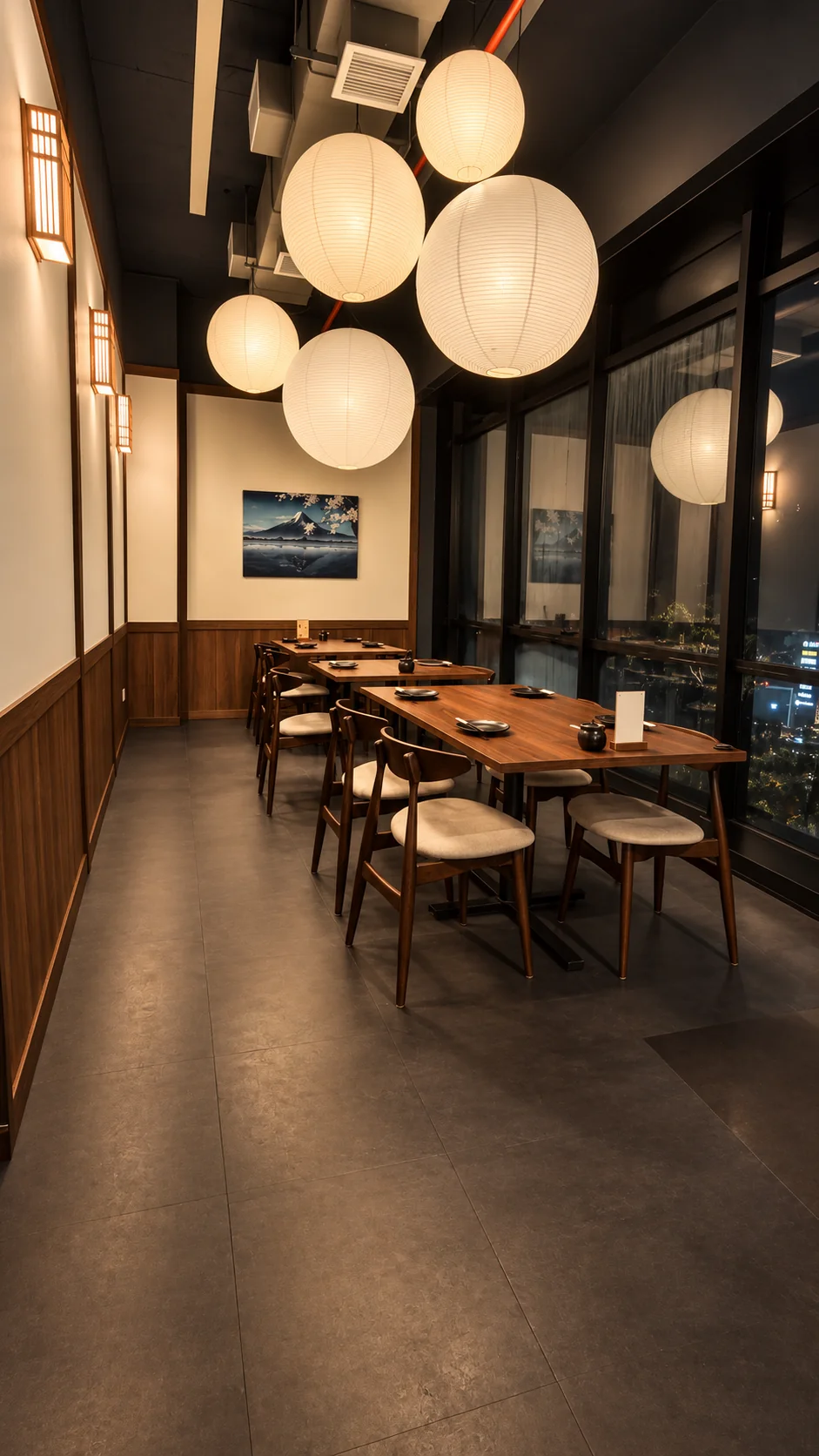 Dining tables by the windows under Japanese lanterns